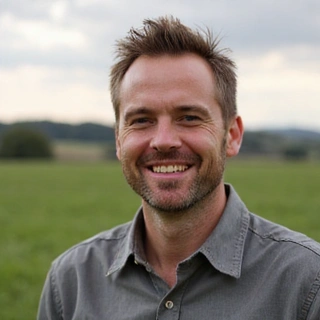 Portrait of Mr. Alistair Finch, Herbanelle's Head of Sourcing, with a warm, trustworthy expression.